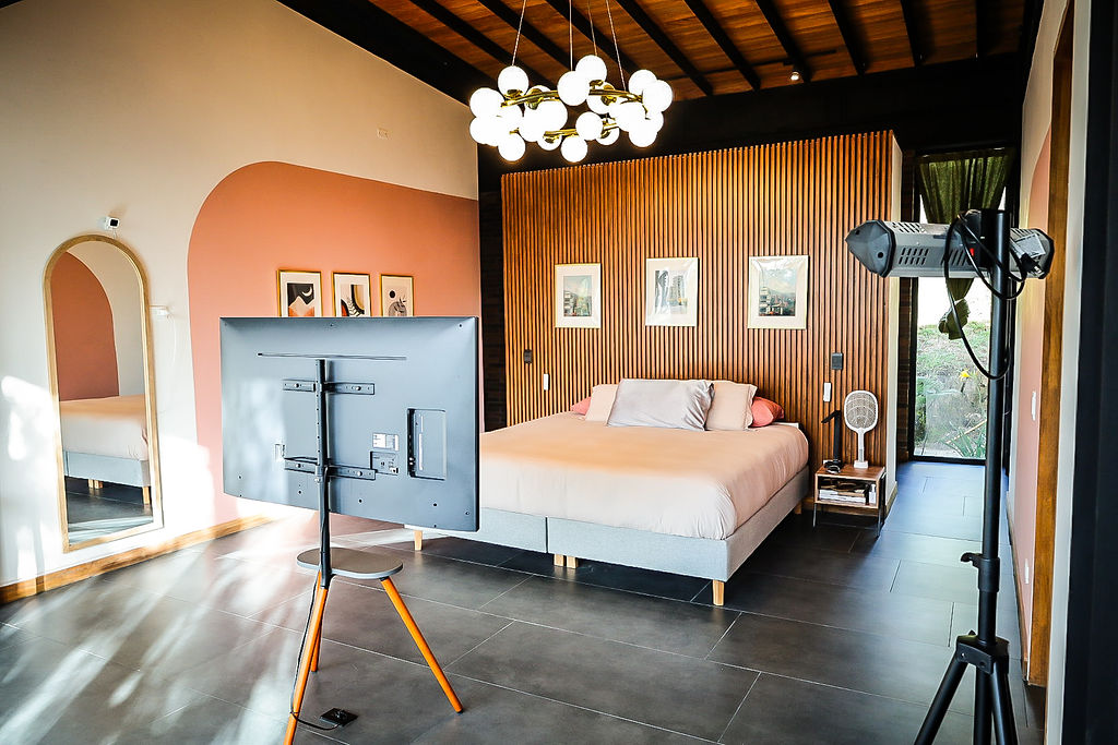Primary suite with warm timber accent wall