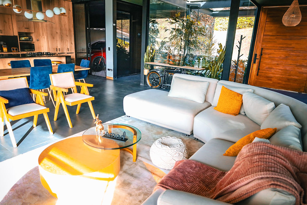 Open-concept living and dining under vaulted ceilings