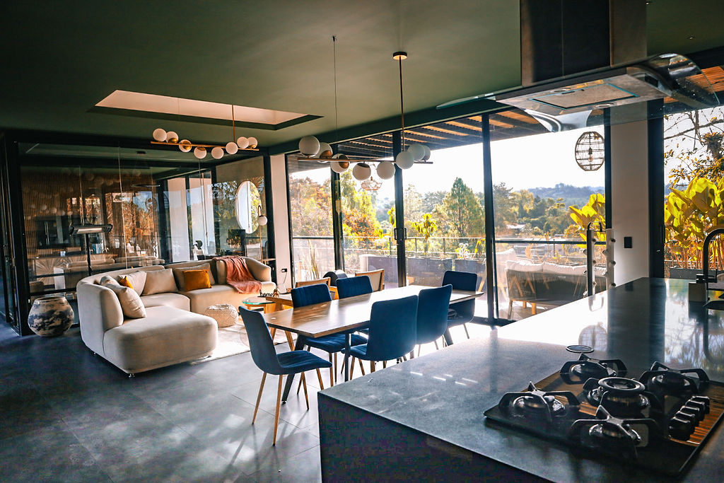 Open-concept living and dining under vaulted ceilings